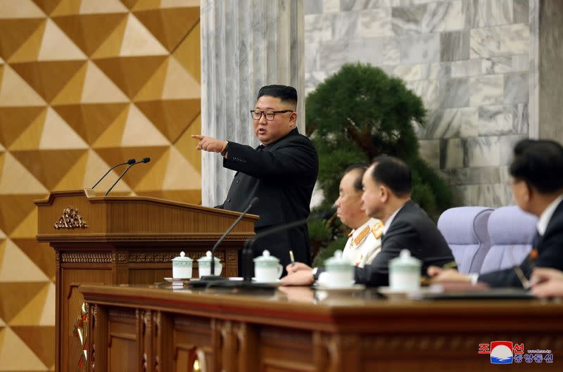 KCNA image of North Korean leader Kim Jong Un at a plenary meeting of the Workers' Party in Pyongyang