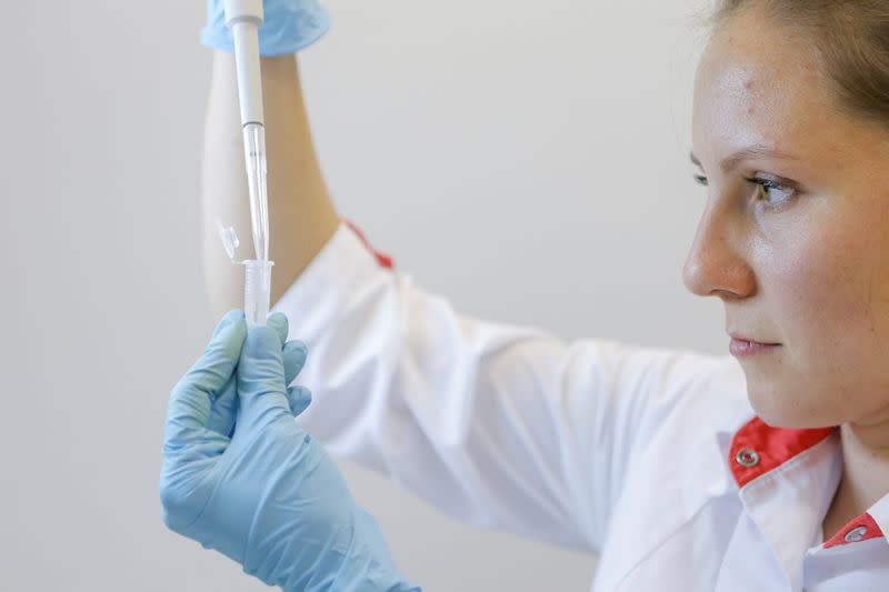 A scientist works inside a laboratory during the production and laboratory testing of a vaccine against the coronavirus disease in Moscow