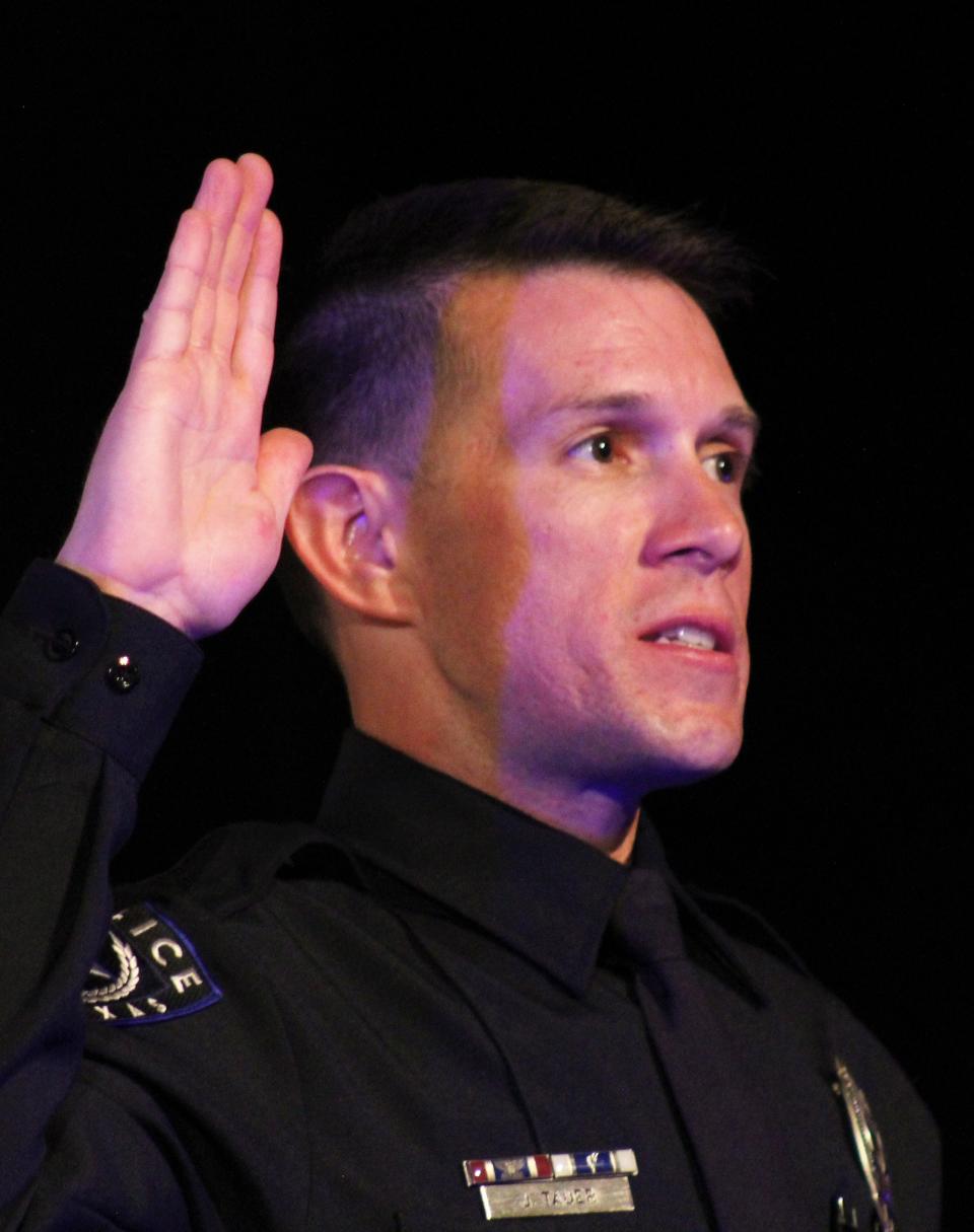 Joshau Tauer, an Army veteran and the oldest member of Class 60 is sworn in Thursday to the Abilene Police Department. He joins his father, Joe, a 35-year APD officer. March 2 2023