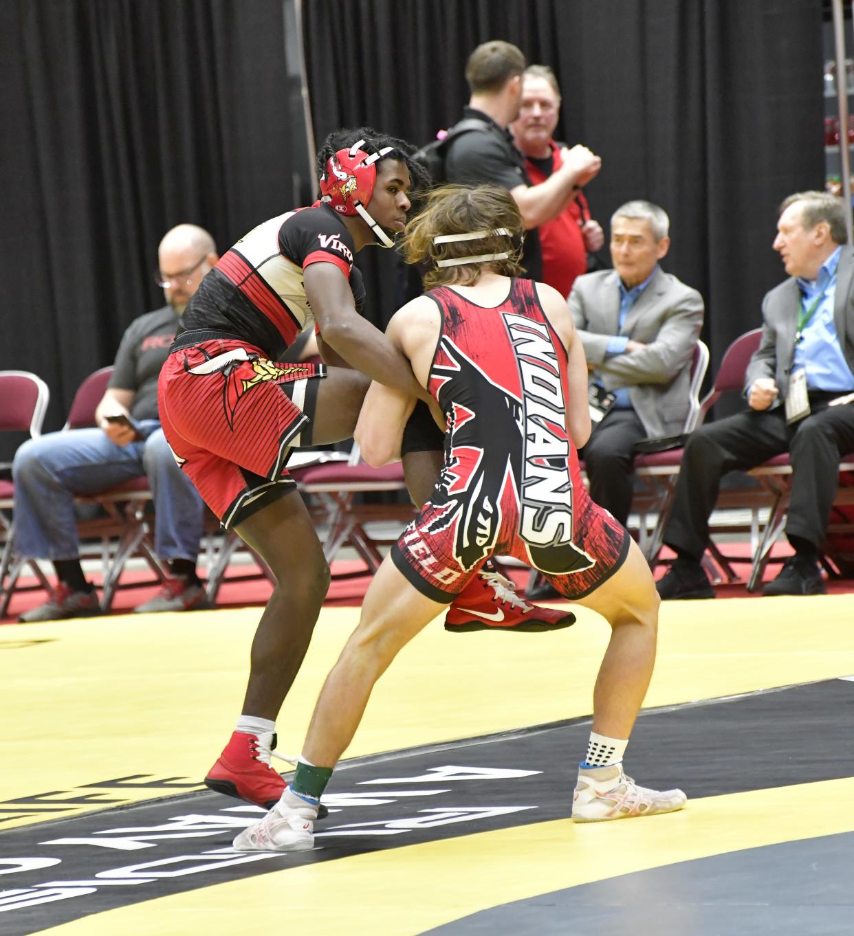 Princeton's Micah Cottrell (left) grapples in the Division I 138-pound consolation round at the OHSAA 86th annual boys wrestling state tournament March 10-12, 2023.