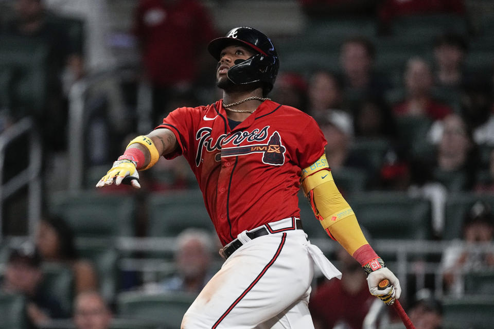 Atlanta Braves' Ronald Acuna Jr. watches his two-run home against the Miami Marlins during the seventh inning of a baseball game Friday, June 30, 2023, in Atlanta. (AP Photo/John Bazemore)