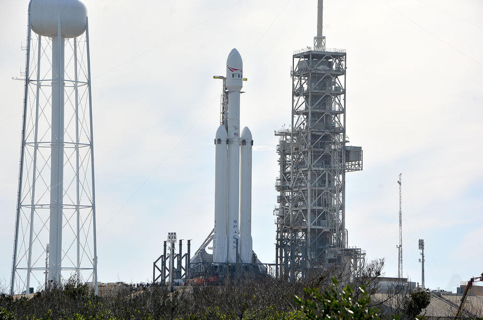 SpaceX’s first Falcon Heavy rocket stands poised for launch on Pad 39A at NASA's Kennedy Space Center in Florida. <cite>collectSPACE.com</cite>