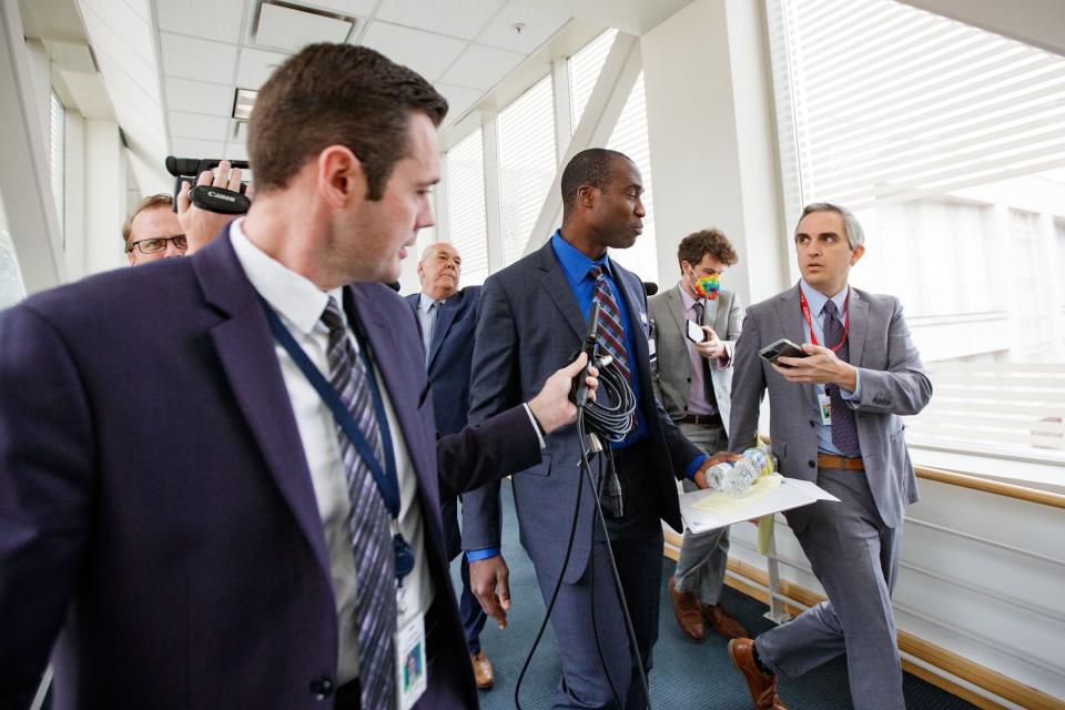 Jospeh Ladapo responds to questions from the media as he leaves the Knott Building following a Senate Health Policy Committee hearing Wednesday, Jan. 26, 2022.