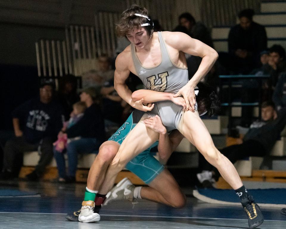 Hesperia's Evan Roy battles with Sultana's Thomas Jablonski in the 132-pound championship match at the 15th annual Adrian Amaral Scholarship Invitational on Saturday, Jan. 7, 2023.