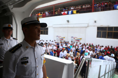 Members of the Chinese People Liberation Army Navy walk at the China's People's Liberation Army (PLA) Navy hospital ship Peace Ark, after its arrival at the port in La Guaira, Venezuela September 22, 2018. REUTERS/Manaure Quintero