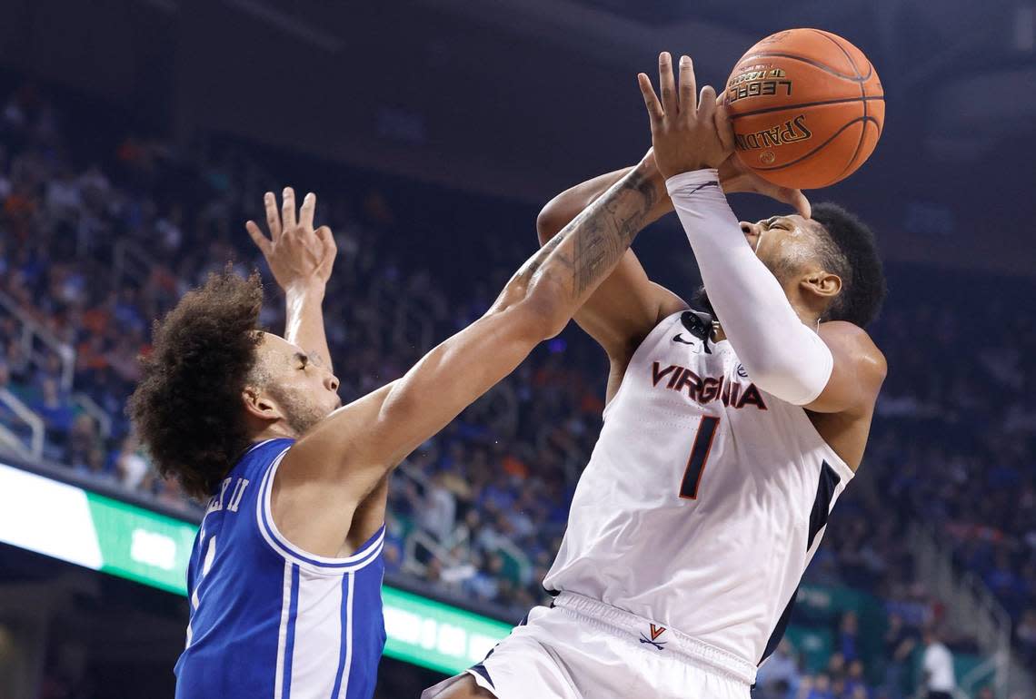 Duke’s Dereck Lively II (1) blocks the shot by Virginia’s Jayden Gardner (1) during the first half of Duke’s game against Virginia in the finals of the ACC Men’s Basketball Tournament in Greensboro, N.C., Saturday, March 11, 2023.