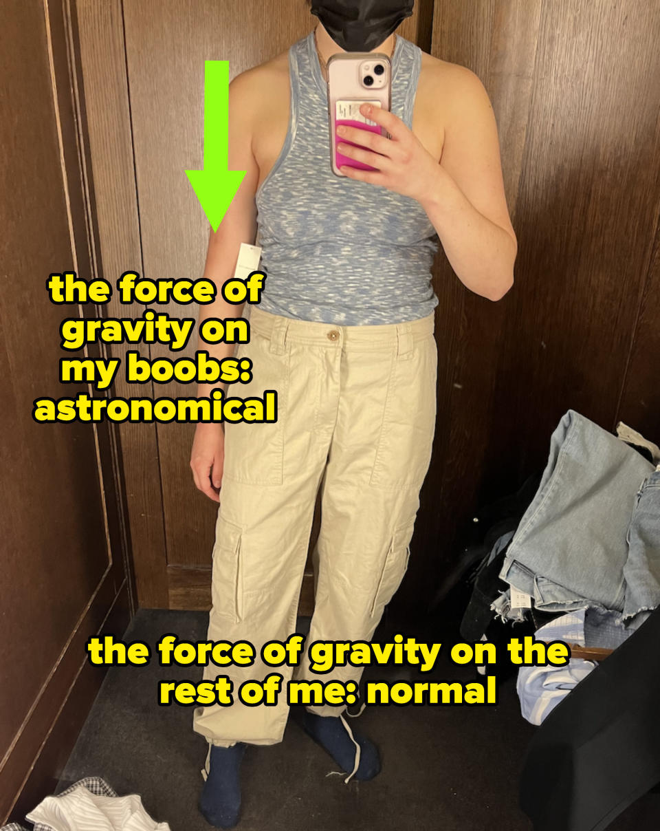 Me in cargo pants and a tank with my boobs labeled "the force of gravity on my boobs: astronomical"
