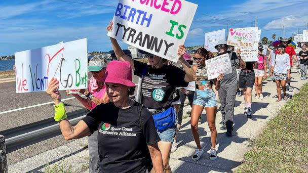 PHOTO: Supporters of abortion rights march along the Eau Gallie Causeway, April 8, 2023, during the 'Shove Your 6-Week Ban' rally, in Brevard, Fla. (Florida Today via USA Today Network)