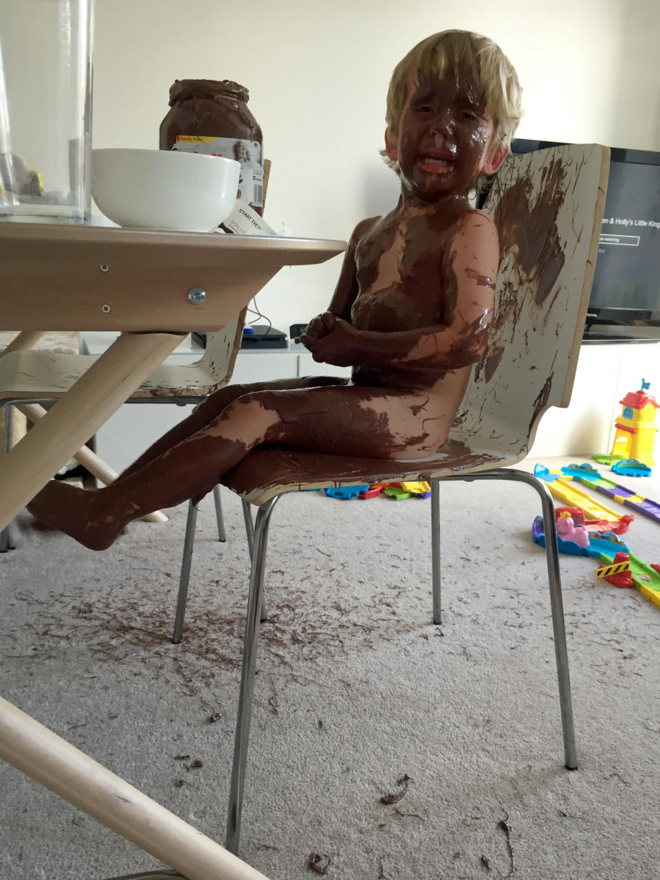 What a mess! Mum Clare was shocked to walk in on her son covered in Nutella. Source: Caters News