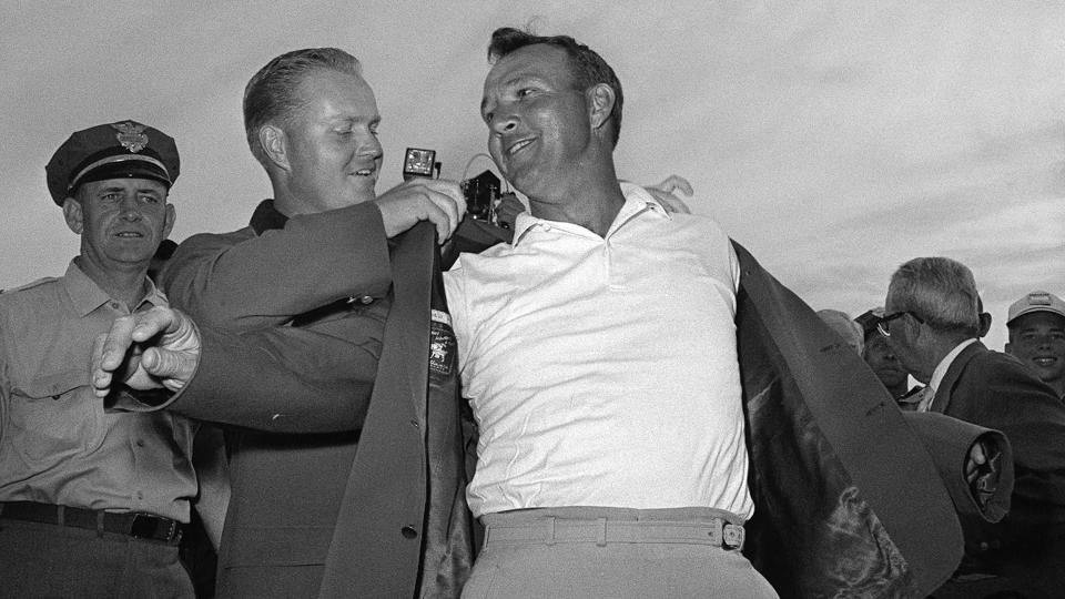 Mandatory Credit: Photo by AP/Shutterstock (6618657b)PALMER Arnold Palmer, right, slips into his green jacket with help from Jack Nicklaus after winning his fourth Masters golf championship onARNOLD PALMER MASTERS, AUGUSTA, USA.