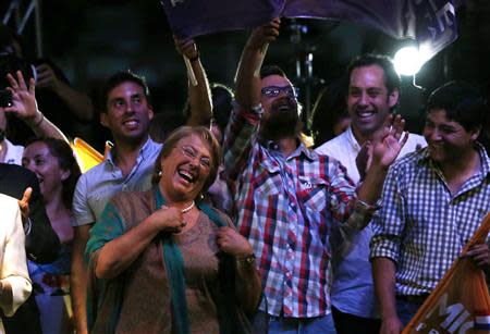 Chilean presidential candidate Michelle Bachelet celebrates after winning Chile's presidential elections, in Santiago, December 15, 2013. REUTERS/Ivan Alvarado