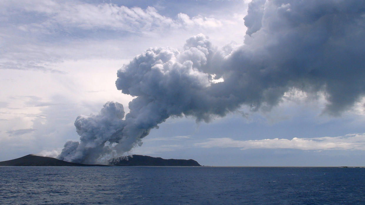 An image of the volcanic eruption that created a substantial new island when it began erupting in December 2014. Source: File/Getty