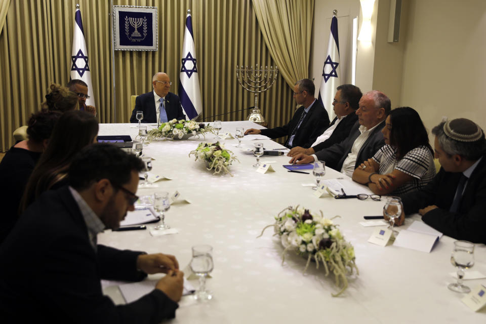 Israeli President Reuven Rivlin speaks during a consultation meeting with members of the Likud party, in Jerusalem, Sunday, Sept. 22, 2019. Rivlin began two days of crucial talks Sunday with party leaders before selecting his candidate for prime minister, after a deadlocked repeat election was set to make forming any new government a daunting task. (Menahem Kahana/Pool via AP)