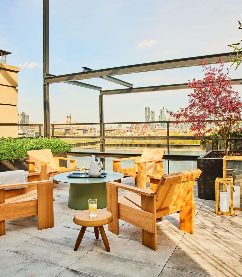 a patio with a table and chairs