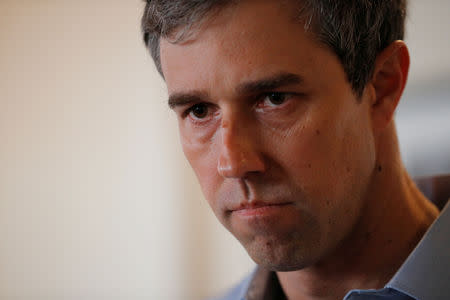 Democratic 2020 U.S. presidential candidate and former U.S. Representative Beto O'Rourke listens to a question from the audience during a campaign stop at Popovers Bakery and Cafe in Portsmouth, New Hampshire, U.S., March 21, 2019. REUTERS/Brian Snyder