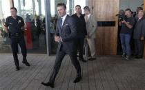 David Beckham arrives to discuss matters related to the ownership position he has with a proposed Major League Soccer (MLS) expansion team, at a news conference in Miami, Florida February, 5, 2014. REUTERS/Andrew Innerarity