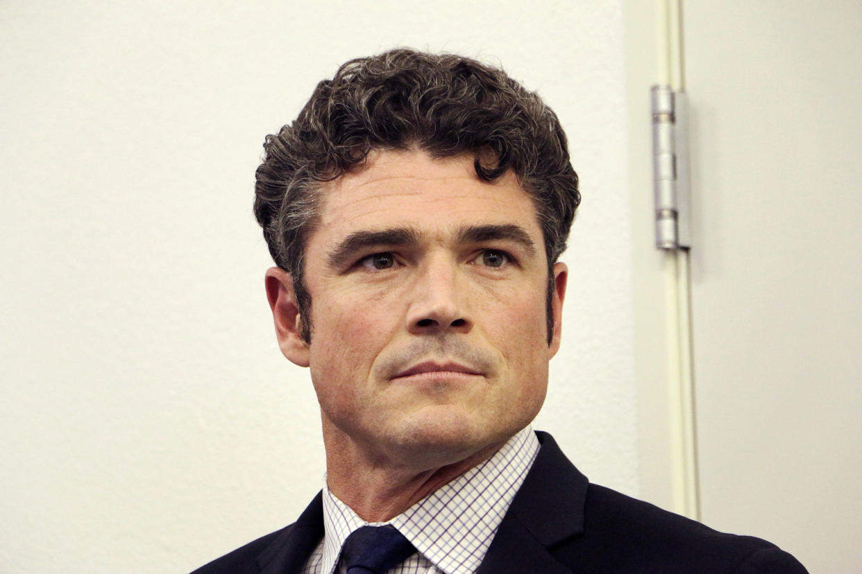 FILE - Republican candidate Joe Kent waits before taking the stage for a candidates debate Tuesday, Sept. 27, 2022, in Vancouver, Wash. Kent is seeking election to Washington's 3rd Congressional District in the Nov. 8, 2022 election. (Rachel La Corte / AP file)