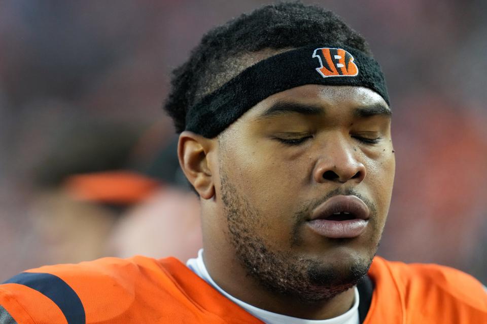 Bengals offensive tackle Orlando Brown Jr. (75) returns to the sideline between drives in the fourth quarter of the NFL Week 12 game between the Cincinnati Bengals and the Pittsburgh Steelers at Paycor Stadium.