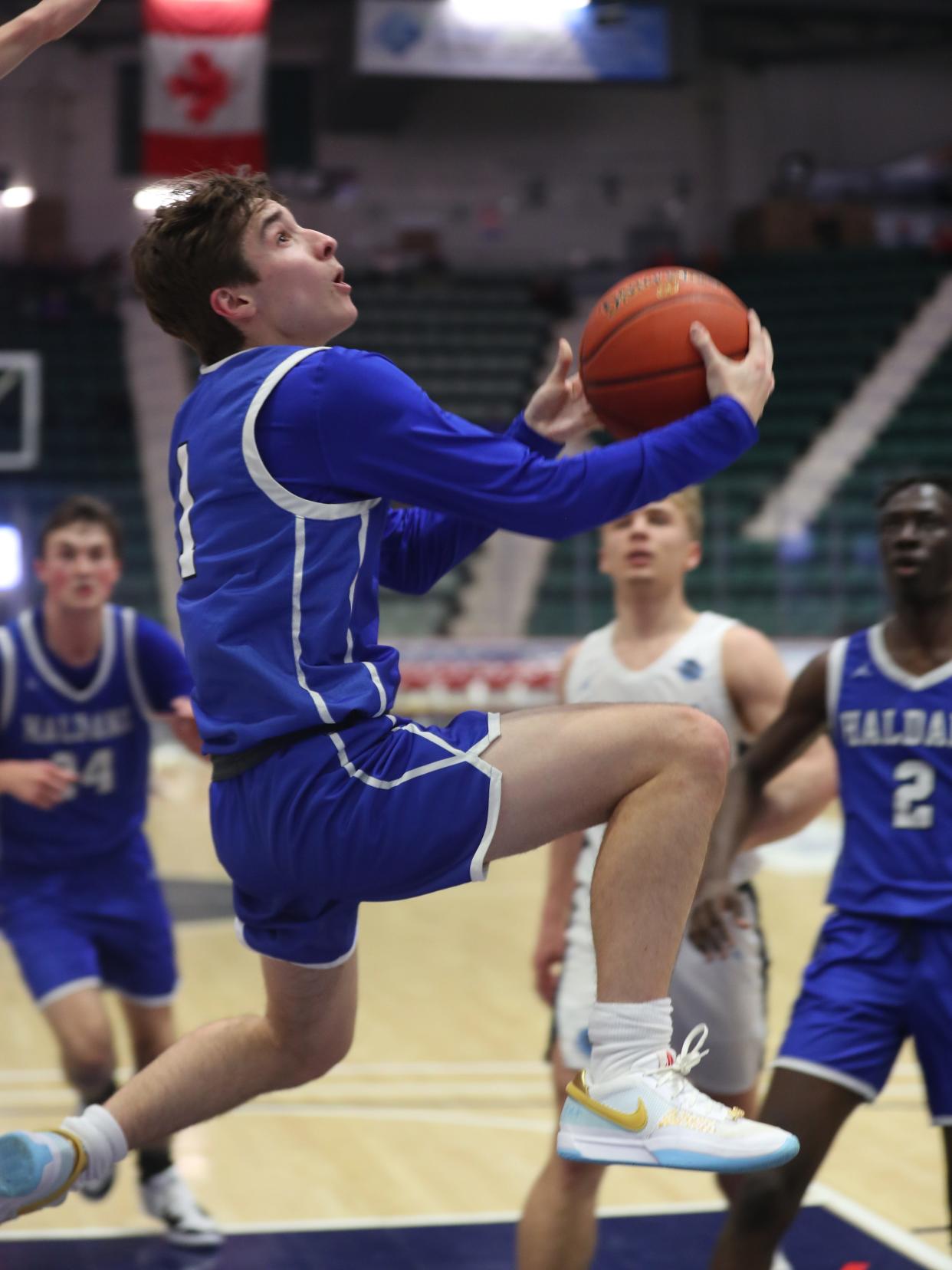 Haldane's Ross Esposito drives to the basket against Moravia during the Class C boys basketball state final on March 16, 2024.