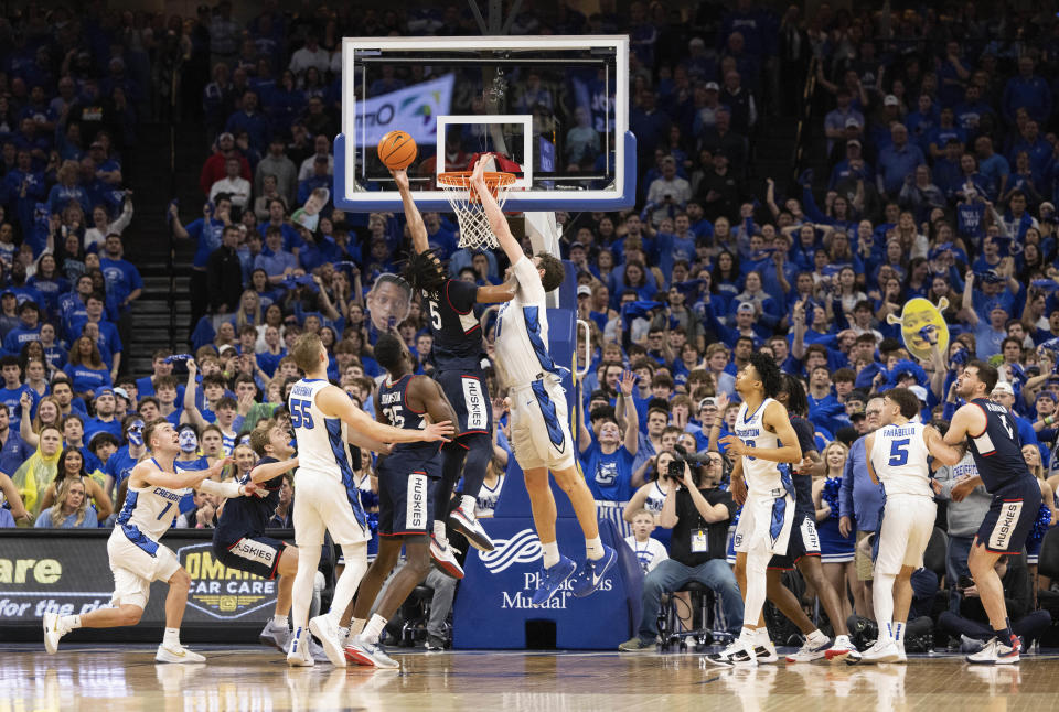 UConn's Stephon Castle (5) shoots against Creighton's Ryan Kalkbrenner during the second half of an NCAA college basketball game Tuesday, Feb. 20, 2024, in Omaha, Neb. Creighton won 85-66. (AP Photo/Rebecca S. Gratz)