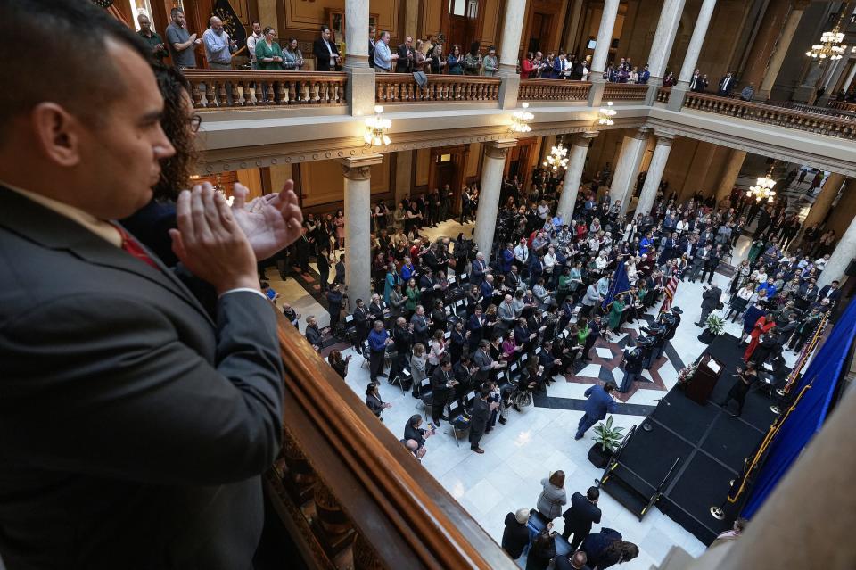 Spectators watch Indiana's oath of office ceremony Monday, Jan. 9, 2023, at the Indiana Statehouse in Indianapolis.