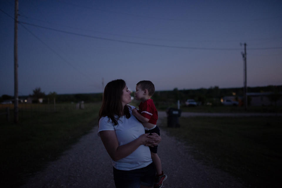 Christina Thomason 39, and son Logan, Tecumseh, Okla. “You can’t tell people to stay home and not care for them. I’m watching everything we worked for being flushed down the toilet. How are we going to come back from this?” she says. | September Dawn Bottoms for TIME