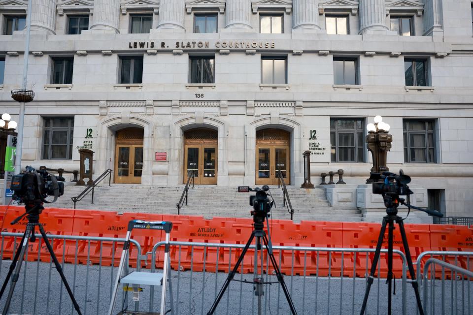 Media cameras are shown set up in front of the Fulton County Courthouse on August 14, 2023 in Atlanta, Georgia. Fulton County District Attorney Fani Willis is expected to announce grand jury indictments in her investigation into former President Donald Trump and his Republican allies' alleged attempt to overturn the 2020 election results in the state.