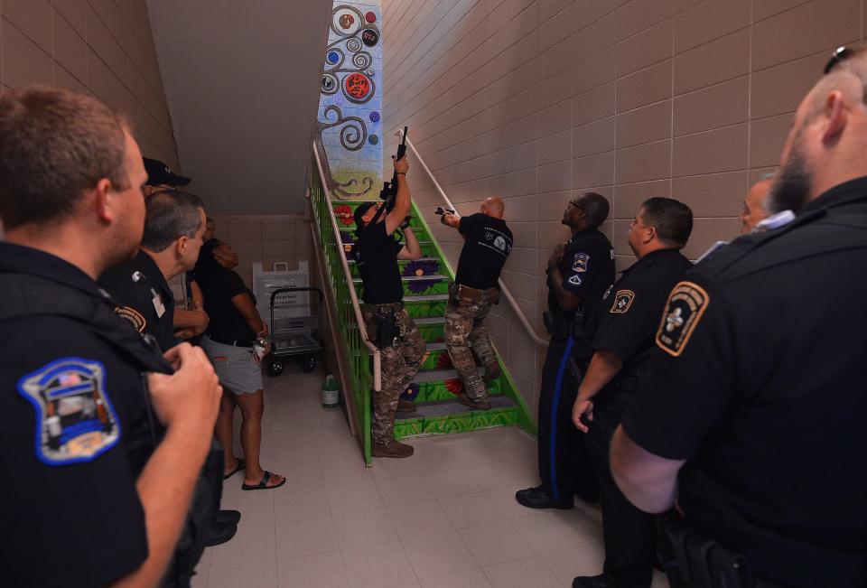 The Spartanburg Police Department holds active shooting training sessions at Pine Street Elementary School in Spartanburg. Police officers, school personnel, and security officers take part in the  training Thursday, July 14, 2022.