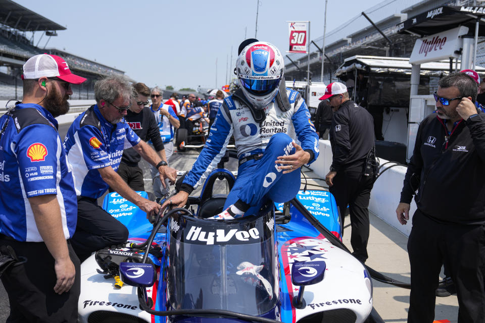 Graham Rahal climbs out of his car during practice for the Indianapolis 500 auto race at Indianapolis Motor Speedway in Indianapolis, Wednesday, May 17, 2023. (AP Photo/Michael Conroy)