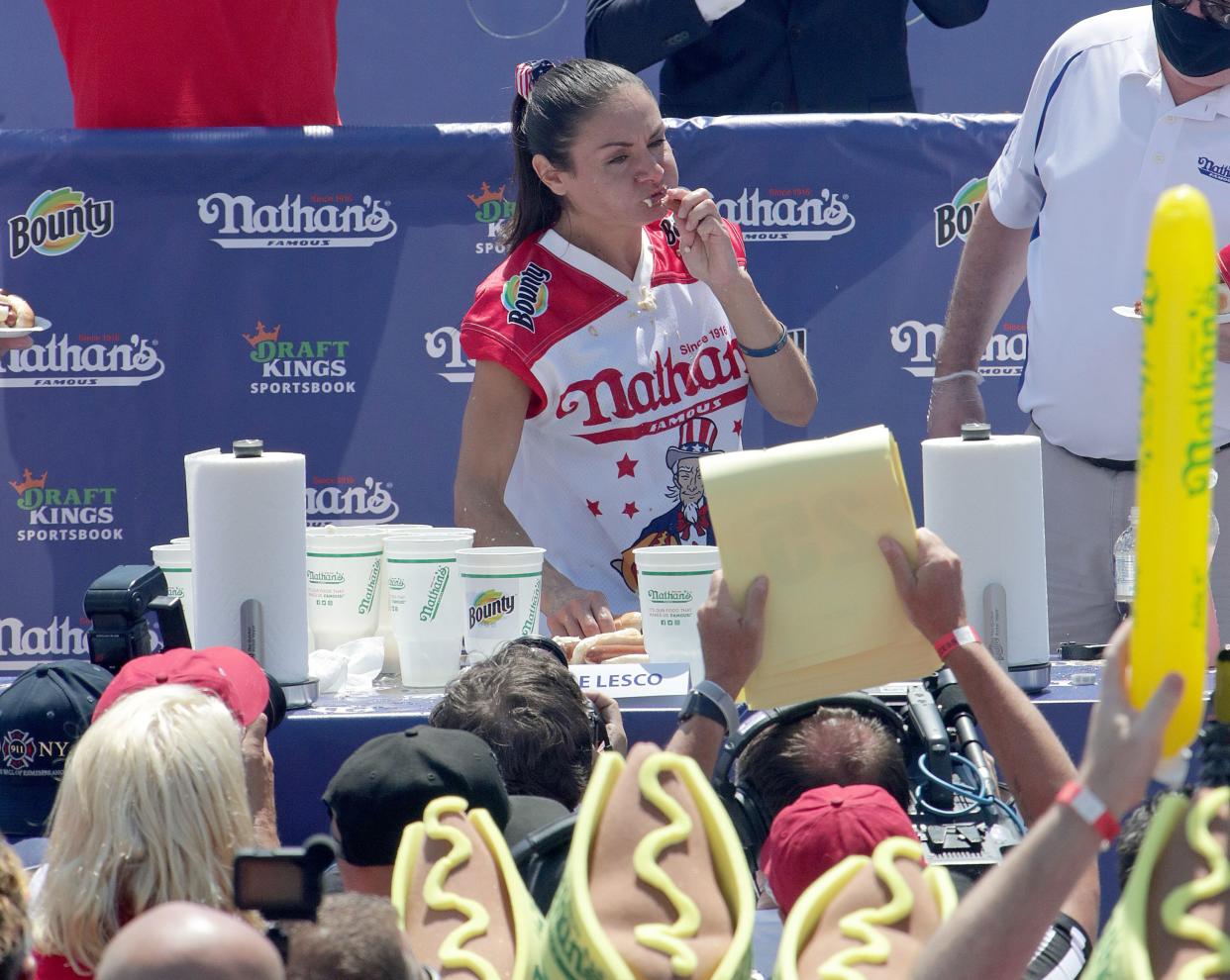 Competitive eater Michelle Lesco competes in the Nathan's Fourth of July Hot Dog Eating Contest in Coney Island on Sunday. 