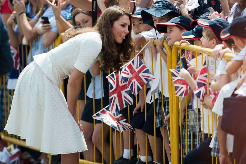 <p>A playful Duchess of Cambridge sticks her tongue out at young fans greeting her at Gardens by the Bay during her visit to Singapore.</p>