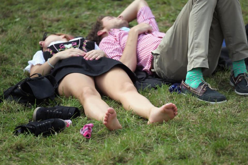 Knocked out, or just taking a break? Revellers rest near the Hofbraeuhaus beer tent at the world's biggest beer festival, Oktoberfest.