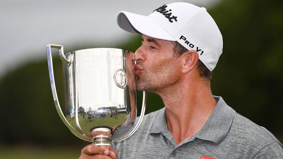 Adam Scott is seen here kissing his Australian PGA Championship trophy in 2019.