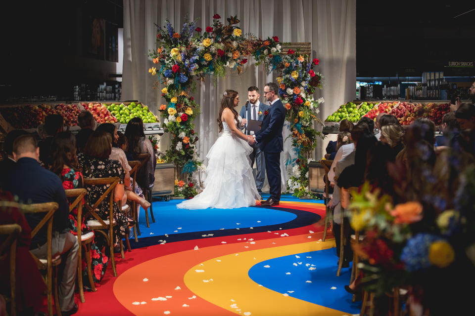 Mike and Jessica Hurd exchange vows in an Aldi on Nov. 9 in Batavia, Illinois. (Courtesy Fig Media)