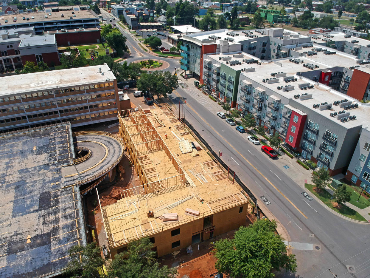 Construction continues on Pasteur Flats, left, across the street from the Lift Apartments, at right, in Oklahoma City, Monday, Aug. 21, 2023.