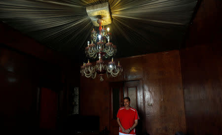 Hisham Abu al-Ela, a 55-year-old businessman, looks on at his house which hasn't been demolished yet, in the so-called "Maspero Triangle", in Cairo, Egypt, September 13, 2018. REUTERS/Amr Abdallah Dalsh