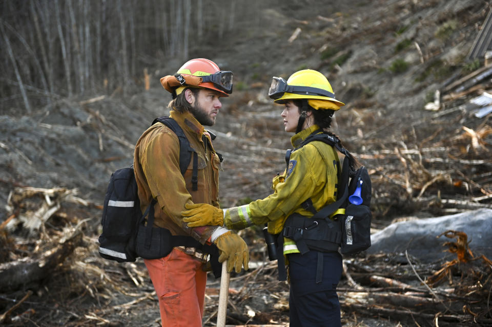 FIRE COUNTRY (9:00-10:00 PM) “I Know It Feels Impossible” – The station 42 and third rock crews face a daring rescue when a massive mudslide tears through Edgewater. Meanwhile, Bode’s (Max Theriot) freedom is on the line at his parole hearing. First season finale airing May 19.  Pictured (L-R): Max Thieriot as Bode Donovan and Stephanie Arcila as Gabriela Perez.  Photo: Sergei Bachlakov/CBS ©2023 CBS Broadcasting, Inc. All Rights Reserved.