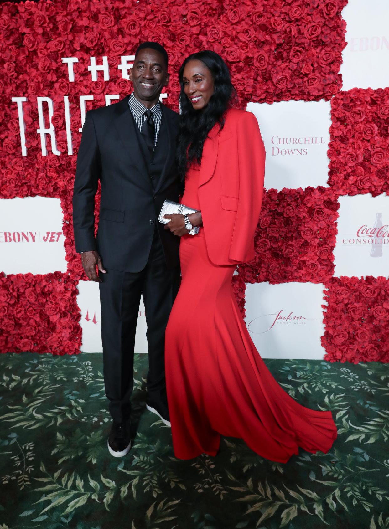 Former WNBA player Lisa Leslie, right, and Michael Lockwood arrive on the red carpet during the Trifecta Gala in Louisville, Ky. on May. 3, 2024.