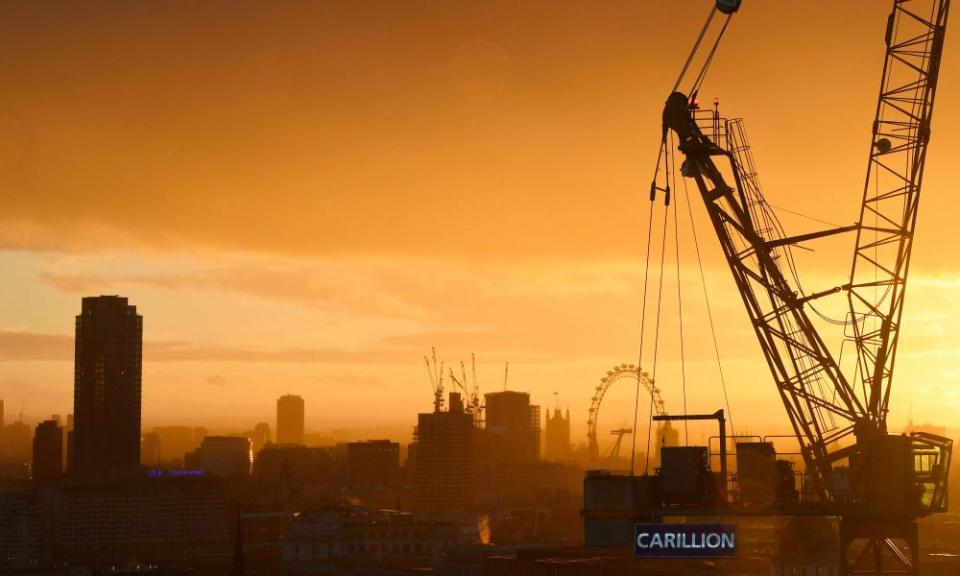 Carillion construction site set against cranes and London skyline