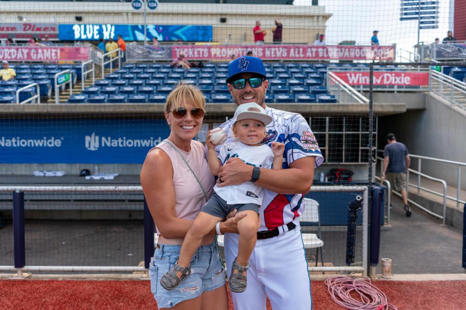 Blue Wahoos manager Kevin Randel with wife LIndsey and son Lukas prior to Saturday's game where Randel won his 100th game as Blue Wahoos manager.
