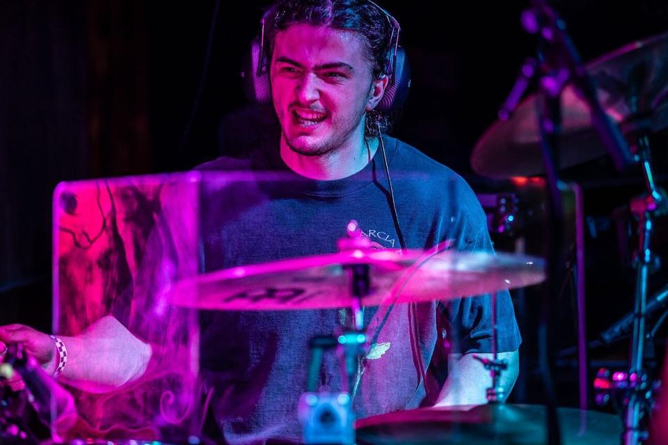 Joey Babick, Dogs In A Pile drummer, mid-song