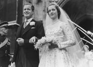 <p>Here are Diana’s parents, Viscount Althorp and the Honorable Frances Roche at their wedding at Westminster Abbey. Their marriage later ended in divorce in 1969.</p>