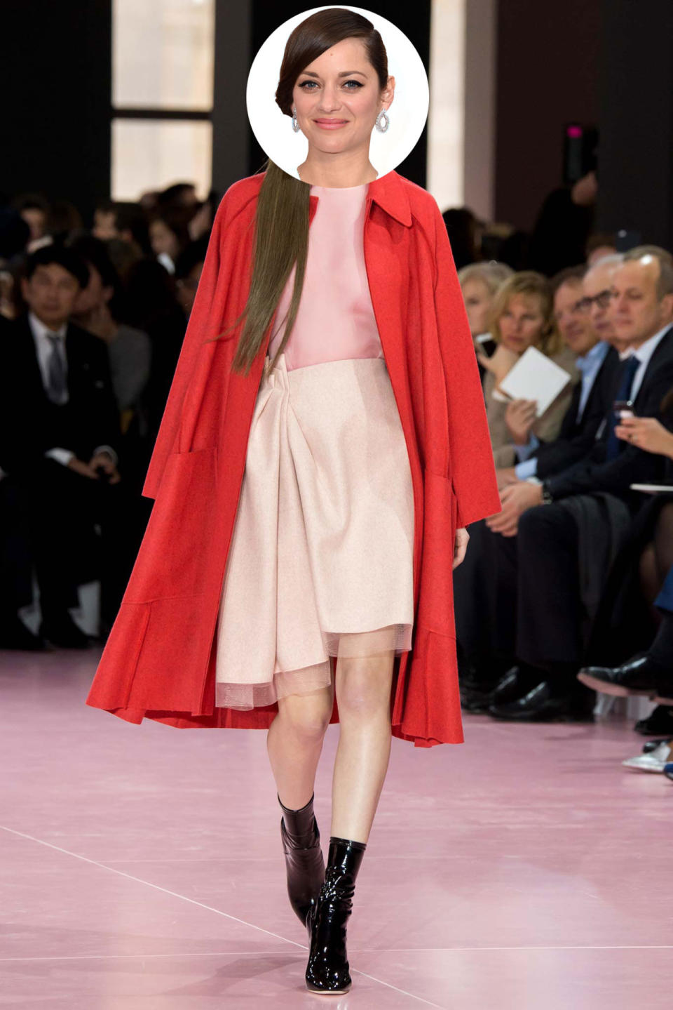 Marion Cotillard epitomizes French style and this prim pink dress topped with bright red coat and paired with edgy heels Parisian effortlessness combined with cool couture to a tee. 