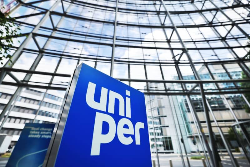 A logo stands in the foyer of the head office of the energy supply company Uniper in Duesseldorf. Good business with electricity generation and gas trading brought German state-owned energy firm Uniper major profits in 2023. Oliver Berg/dpa