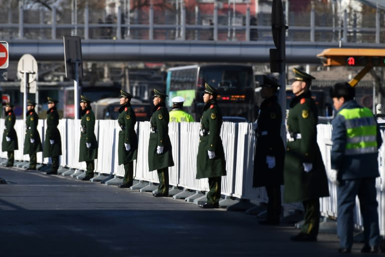 Kim Jong Un's surprise China visit comes as officials from Washington and Beijing meet to address a trade row that has rocked global markets