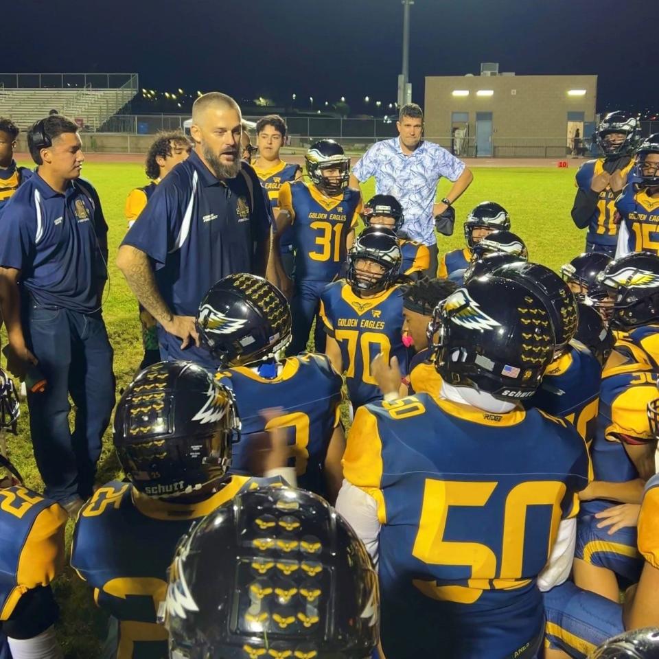 Desert Hot Springs head coach Roy Provost speaks to his team after its 35-27 win over Perris on Friday, Sept. 1, 2023 at Desert Hot Springs High School.