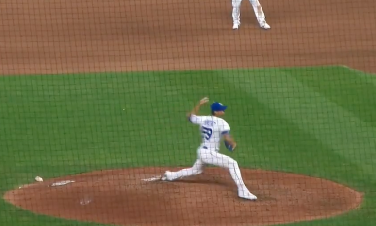 Royals pitcher Jake Brentz throws wild pitch.