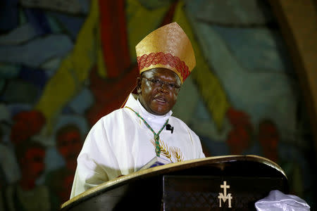 Fridolin Ambongo Besungu, Congolese Roman Catholic Archbishop of Kinshasa speaks during a mass at the Notre Dame de Kinshasa cathedral in Kinshasa, Democratic Republic of Congo, December 24, 2018. REUTERS/Baz Ratner