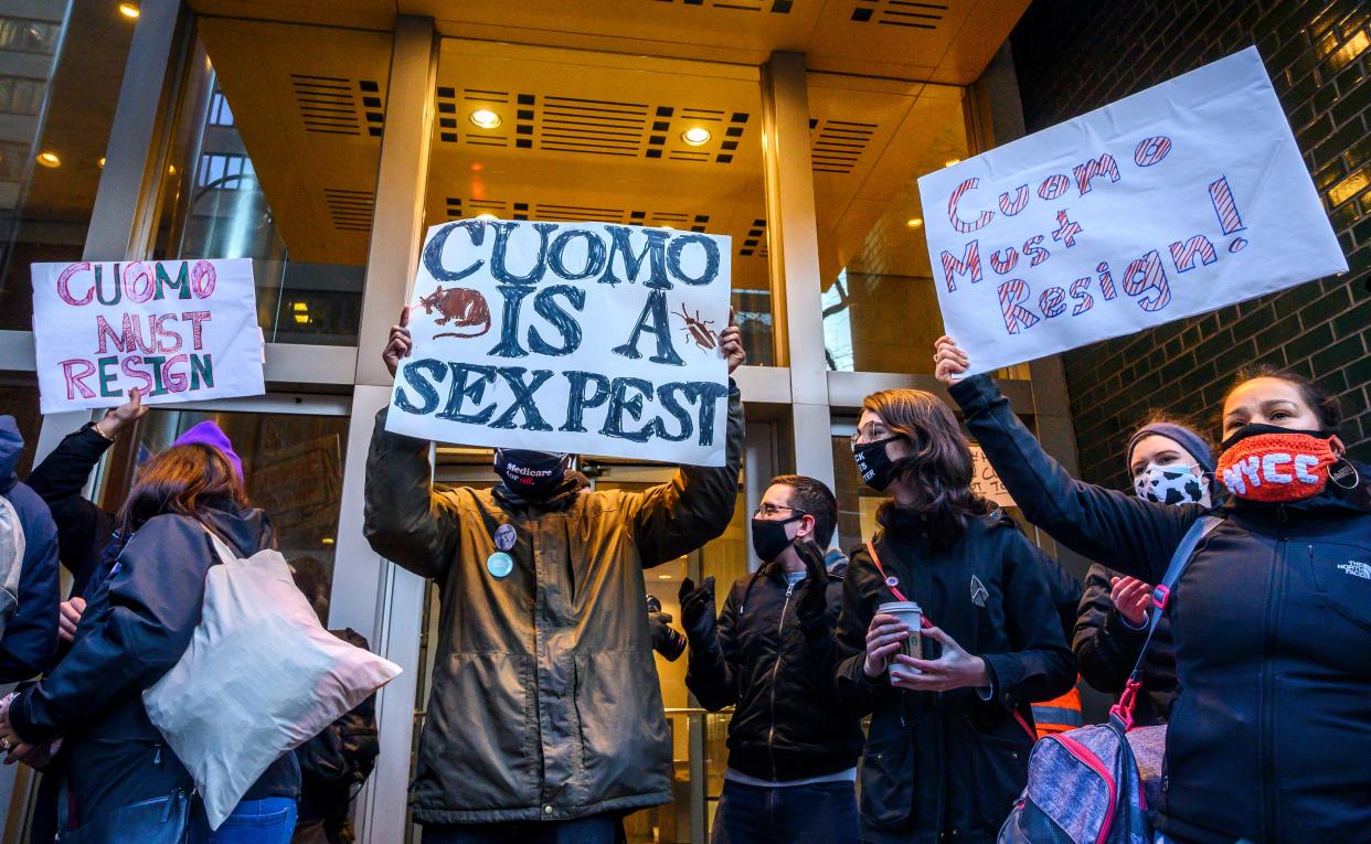 Demonstrators rally for New York Gov. Andrew Cuomo's resignation in front of his Manhattan office in New York, Tuesday, March 2. 