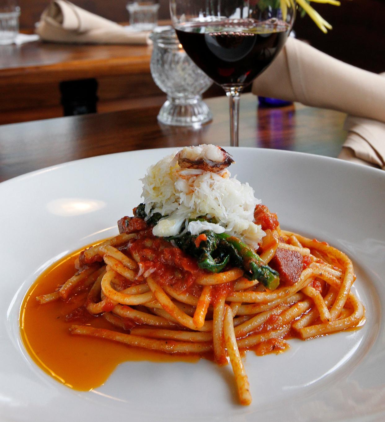 Spicy crab pasta, made with bucatini, San Marzano tomato, Dungeness crab, rapini, ghost pepperoni and basil oil is served at Goodkind, 2457 S. Wentworth Ave., Milwaukee.